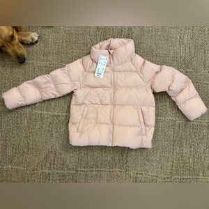 Brand new Uniqlo kids ultra light jacket size 7-8